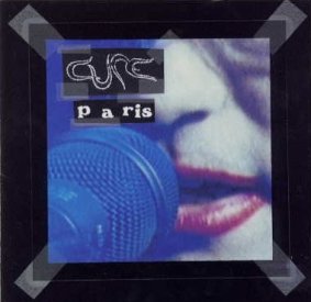 Album cover for 'Paris' by Cure featuring a microphone and a blurred face.