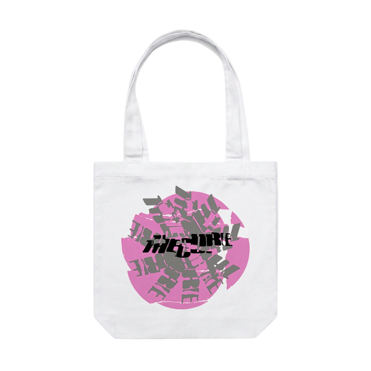 White tote bag featuring a pink, grey and black The Cure logo design on the front