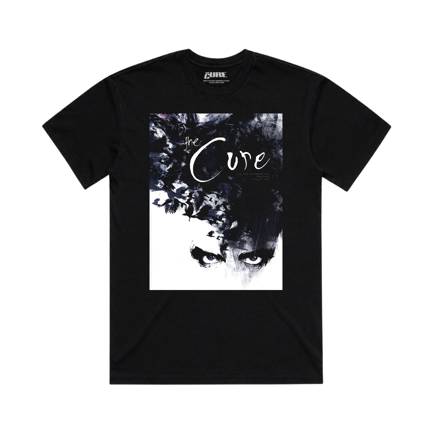 A black short-sleeve crewneck t-shirt featuring a large square graphic print on the front. The graphic is a high-contrast black and white artistic portrait of a face with the words 'the Cure' written across it.